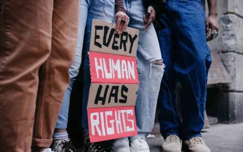 Human Right - group of girls holding signboards