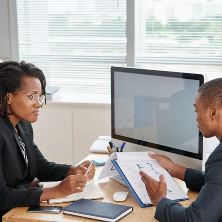 Lawyer at Sona and Partnerss Law firm assisting clients with business registration in Cameroon